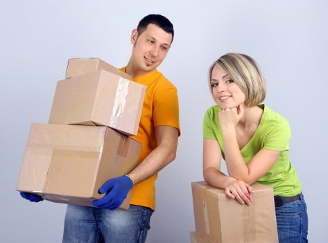 Family organising items for household storage in Tottenhamhale