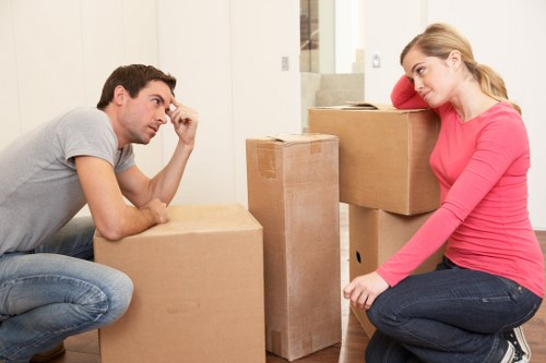 Customer handling boxed items safely in a storage corridor